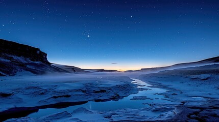 Naklejka premium Serene twilight landscape with a river winding through icy terrain under a starry sky