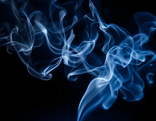 Rotation of Smoke Veils Under Lights on Black Background. This captures the elegant rotation of smoke veils under soft lighting against a black background. The swirling smoke forms intricate patterns