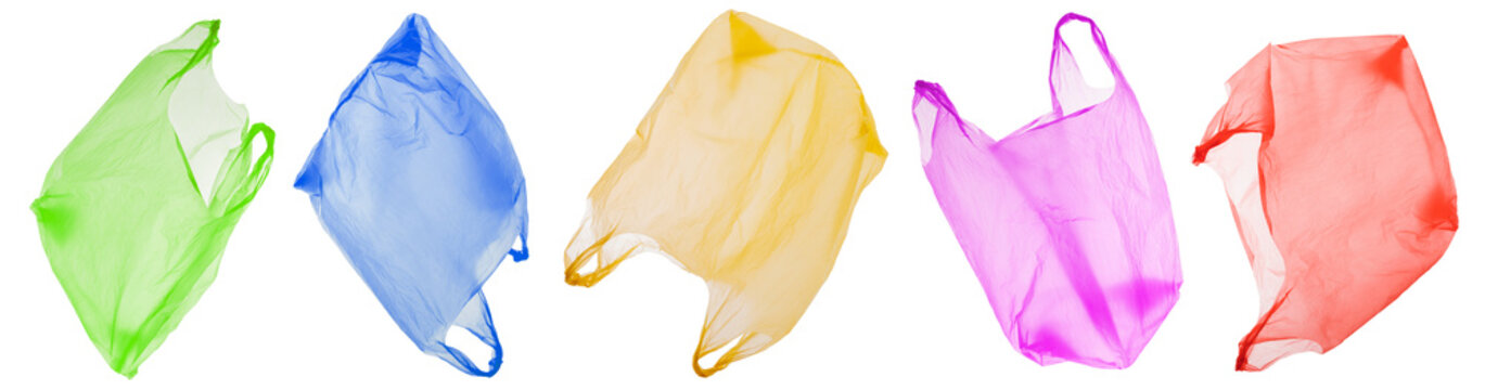  plastic waste pollution: five colorful disposable plastic bags , isolated in various views, banner