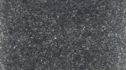 Dark Gray Textured Surface Shows Fine Granular Detail and Subtle Color Variations