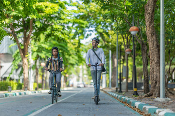 Obraz premium Young Commuters with Eco-Friendly Transportation
