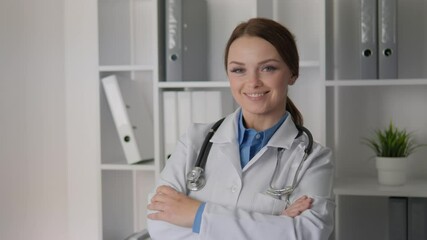 A confident female doctor confidently standing in a modern office setting, showcasing her expertise and professionalism in healthcare and medicine while holding a stethoscope, promoting wellness