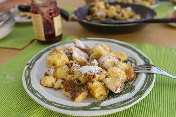 A plate of Kaiserschmarren pancakes with cranberry sauce, dessert, Austria, Europe