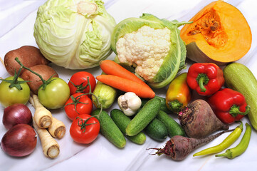 Fresh organic seasonal vegetables on a kitchen table