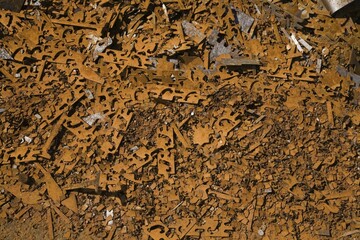 Assorted rusted metal brackets at a scrap metal recycling junkyard, Quebec, Canada, North America