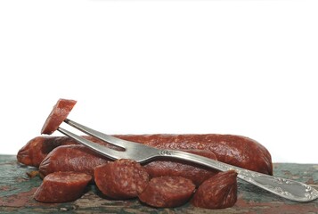 Salami with a fork