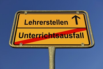 City limit sign, leaving Unterrichtsausfall, entering Lehrerstellen, German for leaving cancelled lessons, entering teaching jobs