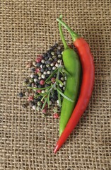 Two peppers and peppercorns