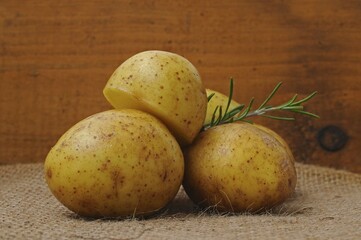Potatoes, rosemary twig