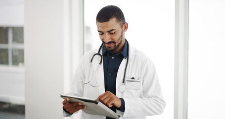 Healthcare, research and doctor with tablet, hospital and man with diagnosis for cure and browsing....