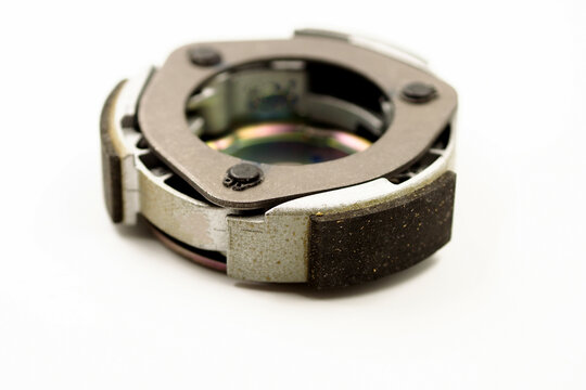 centrifugal clutch set of motorcycle or scooter on white background .Motorcycle automatic clutch uses centrifugal force with the driving shaft nested inside the driven shaft.