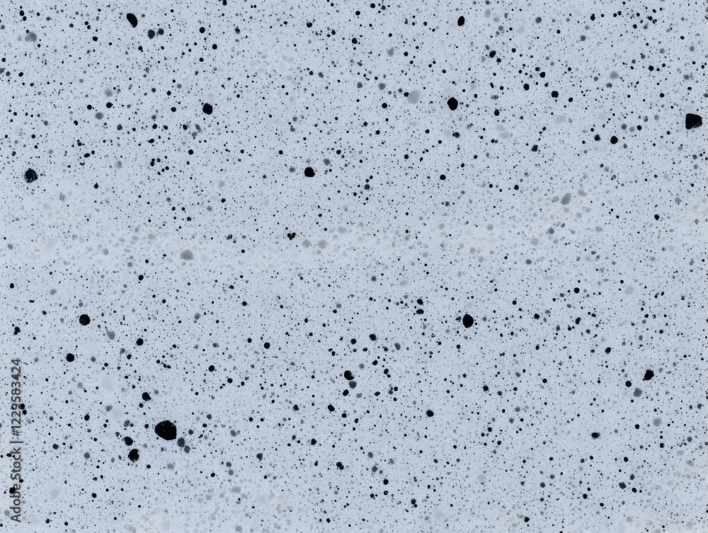 Poster white foam texture with black specks creates a visually interesting and textured background