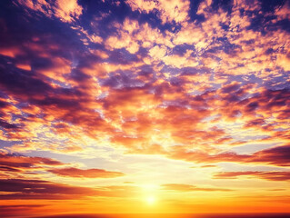 Fototapeta premium Vivid Sunset Paints the Sky with Orange and Purple Hues through Dramatic Cloudscape Beautifully