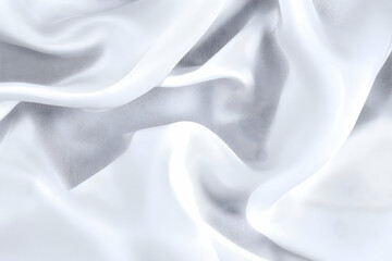 Obraz premium White Fabric Flows Gracefully, Creating Elegant Folds and Textures Gently