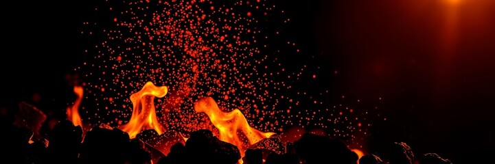 Intense Fire Flames with Flying Embers on a Dark Background