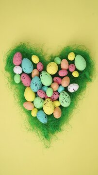 vertical easter eggs stop motion animation on yellow background
