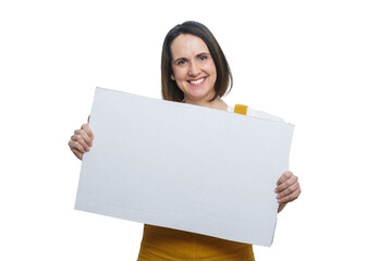 Smiling woman with short hair and dressed in yellow holding a blank sign ready for personal or...