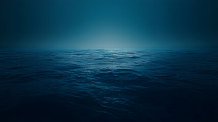 Obraz premium Serene deep blue ocean at night, calm waves, dark moody atmosphere, peaceful waterscape.