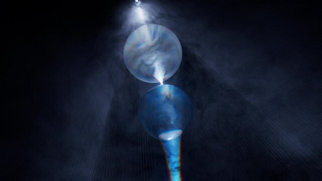 Light rays refraction through glass spheres 3d animation.  Volumetric caustics optical effect.
