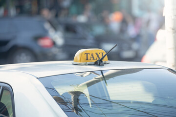 Taxi in the city street at summer.