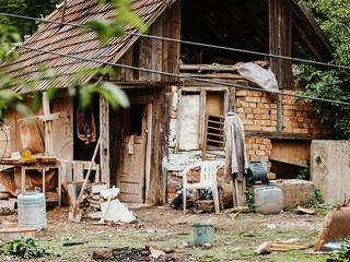 Improvised Housing With Makeshift Structures And Scattered Debris: A Scene Depicting Poverty,...