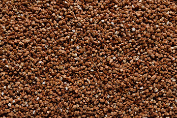 close up brown raw buckwheat background