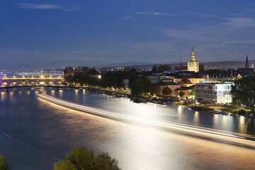 Obraz premium Light tracers of ships on the Rhine River during the Seenachtfest Festival, Constance Minster at the rear, Konstanz, Baden-Württemberg, Germany, Europe