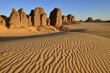 Sanddunes and rock towers in Tiou Tatarene, Tassili n´ Ajjer National Park, Unesco World Heritage...