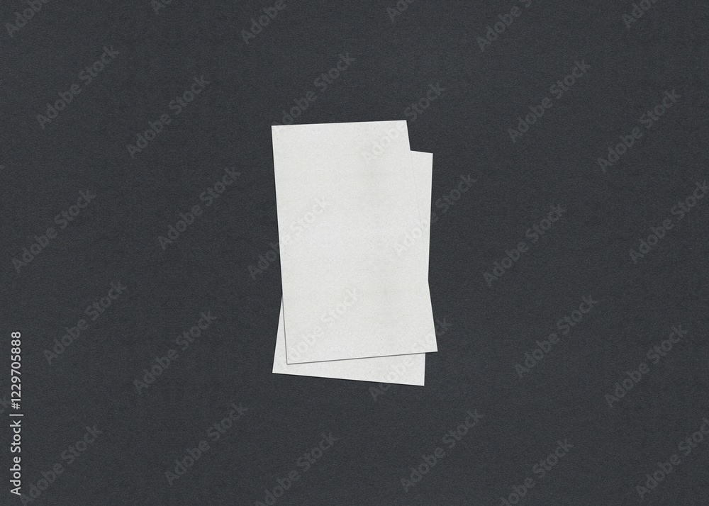 Poster two overlapping vertical rectangular white papers on a dark background, blank white business card mo
