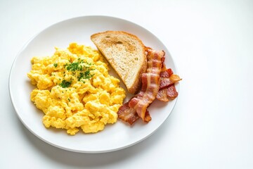 Delicious breakfast of scrambled eggs crispy bacon and toast on a clean white plate perfect for morning meals bright kitchen focused viewpoint