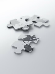 Obraz premium Pieces of a puzzle with a map of the USA