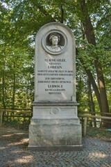 Fototapeta premium Memorial stone for Claude Gelee, called Claude Lorrain, Baroque painter, Harlaching, Munich, Upper Bavaria, Bavaria, Germany, Europe