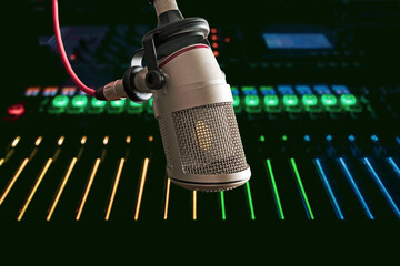 Professional microphone and sound mixer in radio station studio