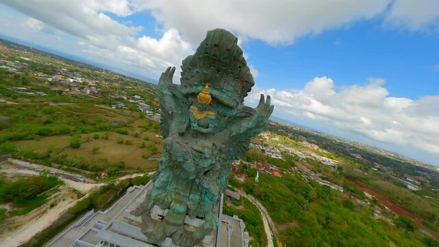Cinematic FPV shot of Garuda Wisnu Kencana Statue in Bali, Indonesia