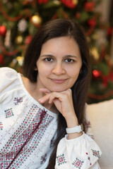 Woman on christmas background. Family christmas concept. Young woman. Smile adult. Happy new year