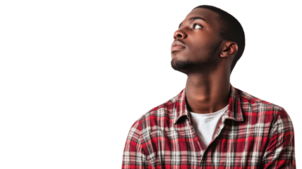 Man gazes thoughtfully upward in a studio setting with neutral background during a modeling session