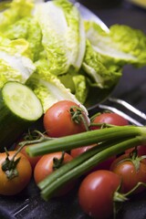 Romaine lettuce, tomatoes, cucumber and chives