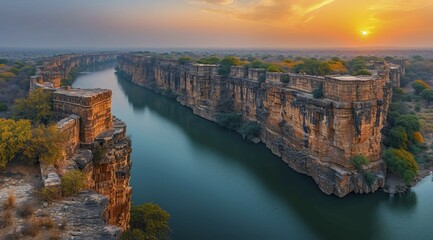 Sunset over Gandikota fort on the banks of the Penner river river with cliffs in Kadapa district, Andhra Pradesh, India during golden hour, AI generated