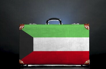 The Kuwaiti flag on a suitcase for travel