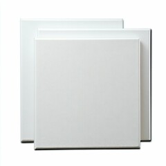Blank White Canvases Stacked on White Background