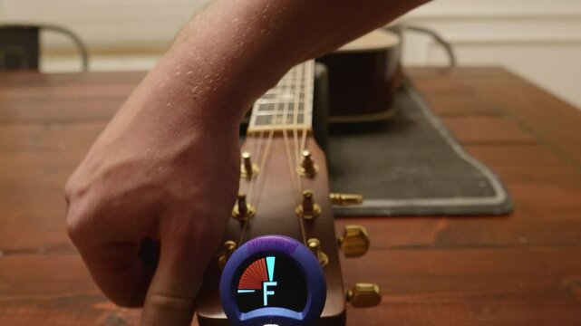 Tuning G String on Acoustic Guitar