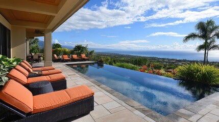 Fototapeta premium A stunning infinity pool surrounded by tropical plants and open-air seating.