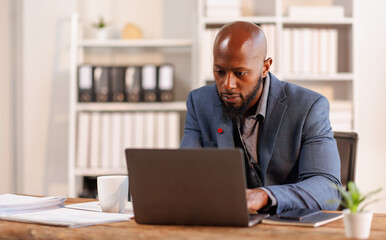 Businessman working at office with documents on his desk, doing planning analyzing the financial...