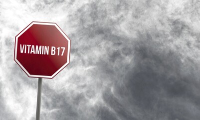 Vitamin B17, red sign with clouds in background