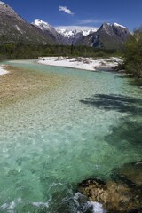 Soča or Isonzo, mountain river with crystal clear, turquoise waters, Bovec, Kanin massif, Julian...