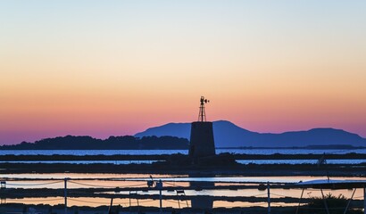 Saltworks Ettore Infersa windmill, Marsala, Laguna Stagnone, Province of Trapani, Sicily, Italy,...