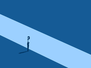 Businessman stands thinking in the gap of problems
