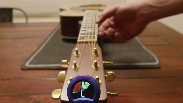 Tuning D String on Acoustic Guitar