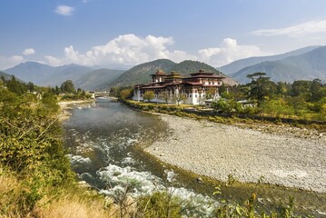 Buddhist monastery fortress Punakha Dzong at the river Mo Chhu, Punakha, Bhutan, Asia