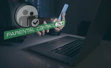 Parental control, child protection concept. Mum setting online content filter with laptop and phone.